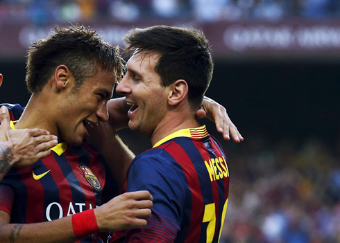 Neymar and Lionel Messi hugging each other in goal celebrations against Real Madrid