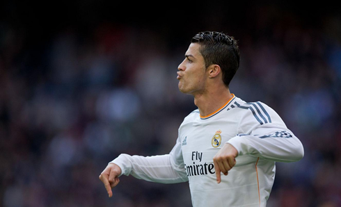 Cristiano Ronaldo pointing to the ground, after scoring for Real Madrid