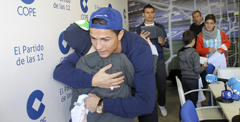 Cristiano Ronaldo hugging a sick kid with leukemia