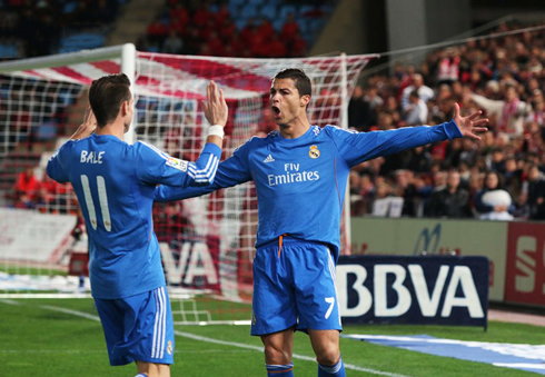 Cristiano Ronaldo and Gareth Bale in a Real Madrid blue jersey