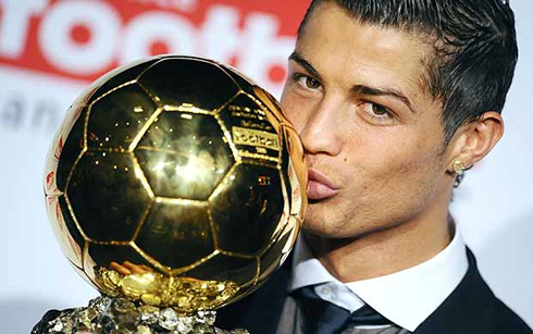 Cristiano Ronaldo kissing the FIFA Ballon d'Or, in 2008