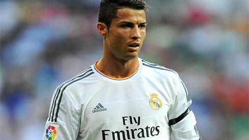 Cristiano Ronaldo wearing a Real Madrid jersey 2013-2014