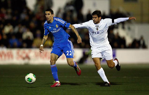 Angel Di María running away from a defender