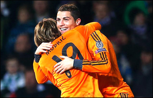 Luka Modric and Cristiano Ronaldo in orange