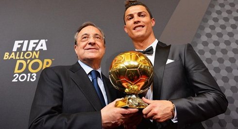 Cristiano Ronaldo and Florentino Pérez, holding the FIFA Ballon d'Or 2013