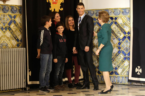 Cristiano Ronaldo posing for a photo with the Portuguese Royal family