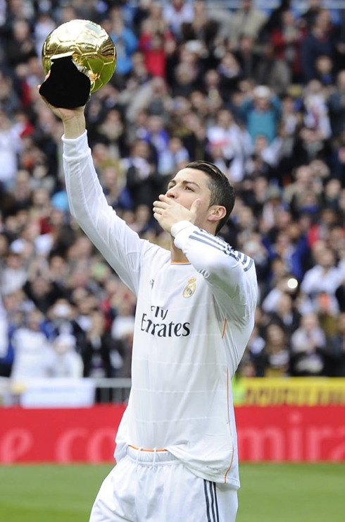 Cristiano Ronaldo sending kisses and showing the FIFA Ballon d'Or to fans in the Santiago Bernabéu
