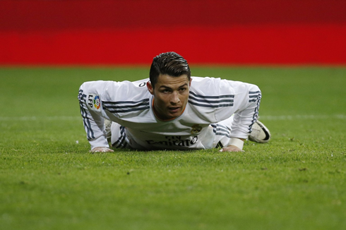 Cristiano Ronaldo doing push-ups on the field