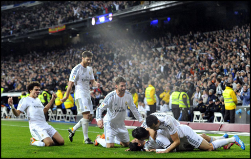 Real Madrid players celebrating victory over Atletico Madrid, in Copa del Rey 2014