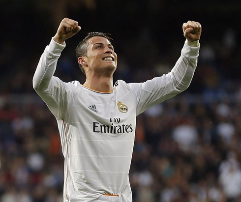 Cristiano Ronaldo fists closed, celebrating goal