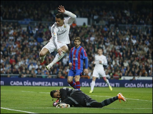 Cristiano Ronaldo jumping above the goalkeeper