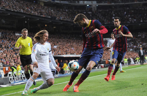 Luka Modric vs Gerard Piqué in a David vs Goliath portrait