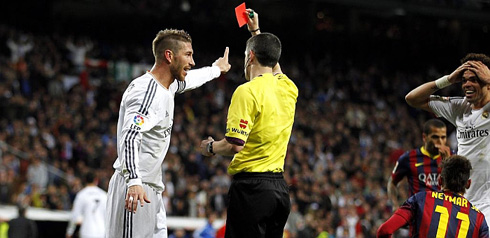 Referee showing Sergio Ramos the red card in Real Madrid vs Barcelona