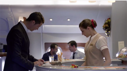 Cristiano Ronaldo and a waitress inside a Fly Emirates plane