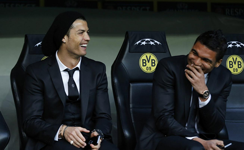 Cristiano Ronaldo and Casemiro smiling on Real Madrid bench