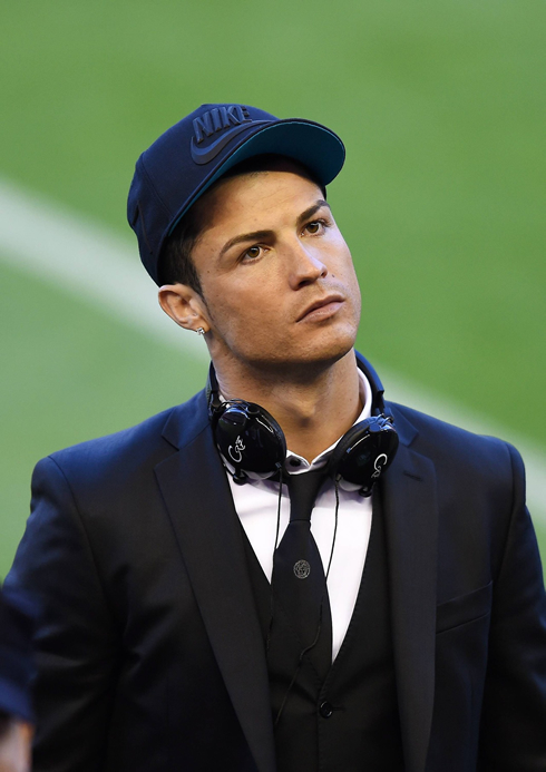 Cristiano Ronaldo with a fully customized headphones set, wrapped around his neck