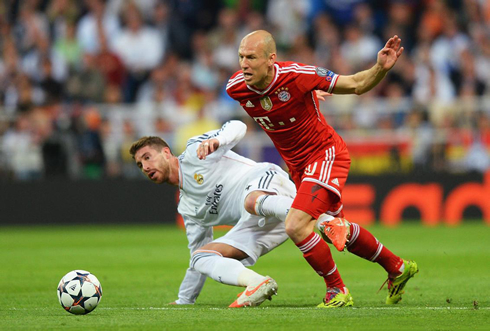 Robben diving with Sergio Ramos near him