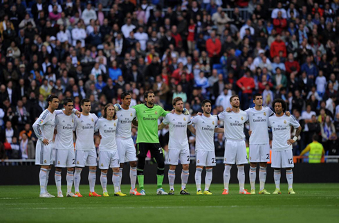 Real Madrid players respecting one minute of silence in honor of Tito Vilanova