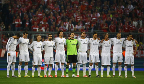 Real Madrid players respecting one minute of silence at the Allianz Arena