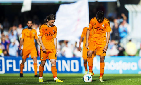 Modric and Morata with their heads down