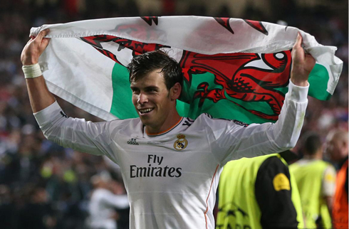 Gareth Bale with Wales flag after winning the Champions League