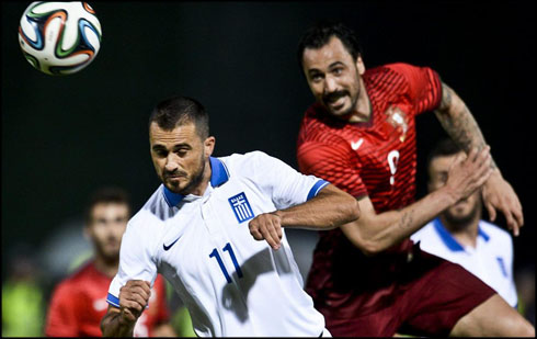 Hugo Almeida fighting for the ball in the air, in Portugal 0-0 Greece