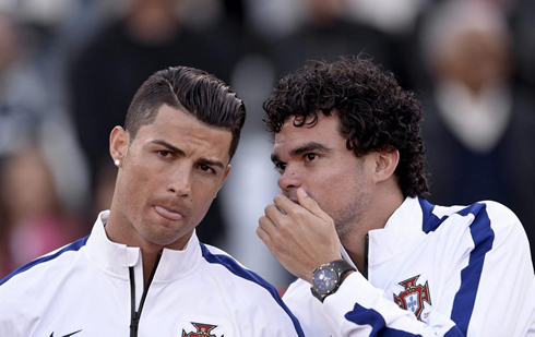 Pepe telling Cristiano Ronaldo a secret