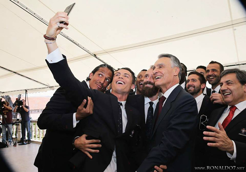 Cristiano Ronaldo taking a selfie with his teammates and the Portuguese President
