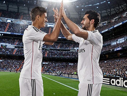 Varane and Arbeloa wearing the Real Madrid new kits for 2014-2015