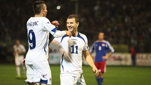 Bosnia Ibisevic and Edin Dzeko, celebrating a goal