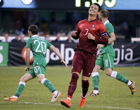 Cristiano Ronaldo walks away from the crime scene, after missing a chance for Portugal
