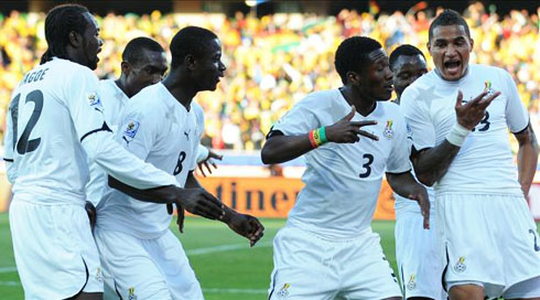 Ghana players dancing and celebrating a goal in 2014