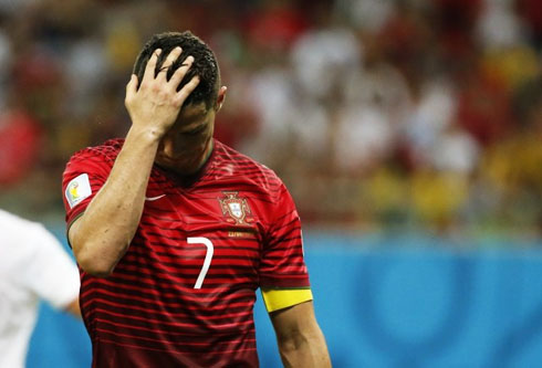 Cristiano Ronaldo looking disappointed with Portugal FIFA World Cup 2014 campaign