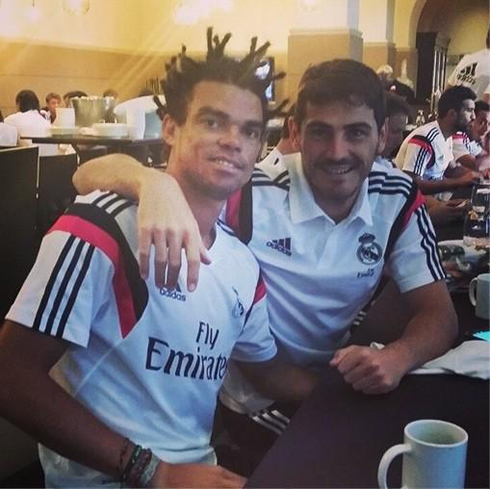 Pepe showing off his new haircut style, with a look very similar to Coolio