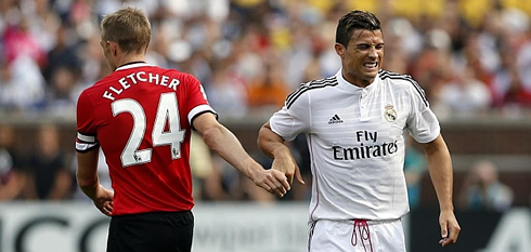 Cristiano Ronaldo hand shaking Fletcher, in Man Utd vs Real Madrid