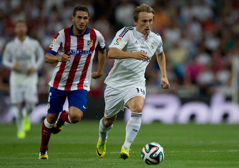 Luka Modric playing for Real Madrid against Atletico Madrid