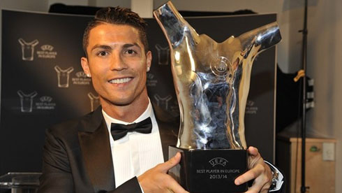 Cristiano Ronaldo showing off his latest trophy, the UEFA Best Player in Europe award