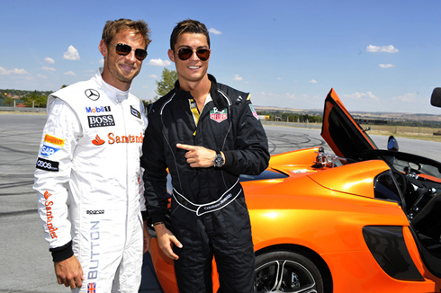 Cristiano Ronaldo and Jenson Button in front of a McLaren F1
