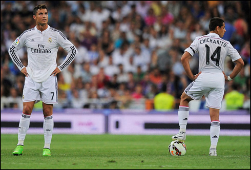Cristiano Ronaldo standing next to Chicharito, in Real Madrid 2014-2015