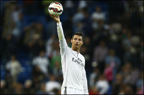 Cristiano Ronaldo holding the football