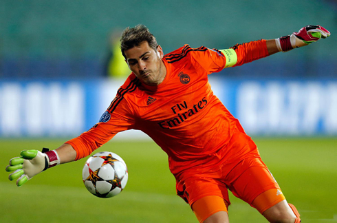 Iker Casillas wearing a Real Madrid orange goalkeeper kit