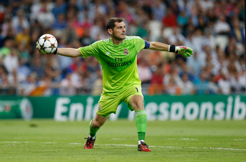 Iker Casillas wearing a green goalkeeper outfit