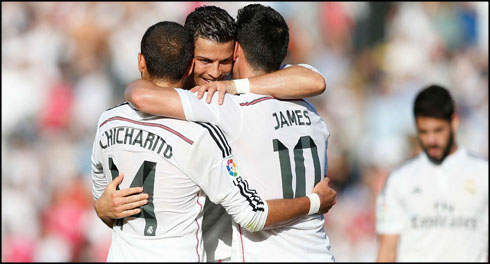 Cristiano Ronaldo hugging Chicharito and James Rodríguez