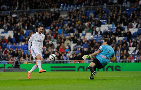 Isco chipping the ball over the goalkeeper