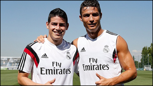James Rodríguez and Cristiano Ronaldo posing for a photo in a Real Madrid training
