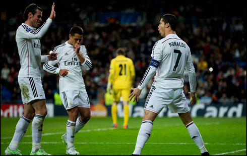 Cristiano Ronaldo celebrates his goal together with Bale and Chicharito