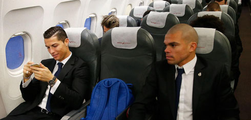 Cristiano Ronaldo next to Pepe, in Real Madrid's airplane