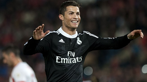 Cristiano Ronaldo wearing Real Madrid's dragon black jersey kit
