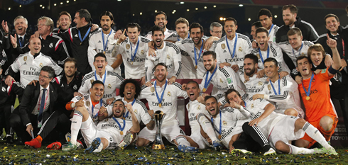 Real Madrid family photo, showing off the FIFA Club World Cup trophy