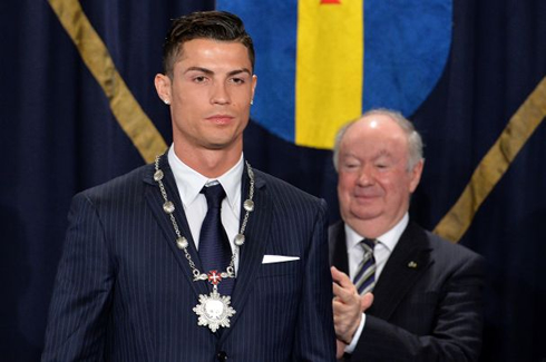 Cristiano Ronaldo receiving a medal from Madeira government
